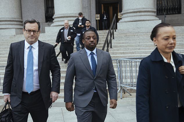 Former New York Lieutenant Governor Brian Benjamin leaves a hearing in federal court on Monday, April. 18, 2022, in New York. Benjamin previously plead not guilty to corruption charges