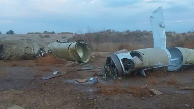 Remains of Iranian missile near al-Baghdadi town - 8 January  Trump: Iran ‘standing down’ after missile strikes  110437792 059015591 1